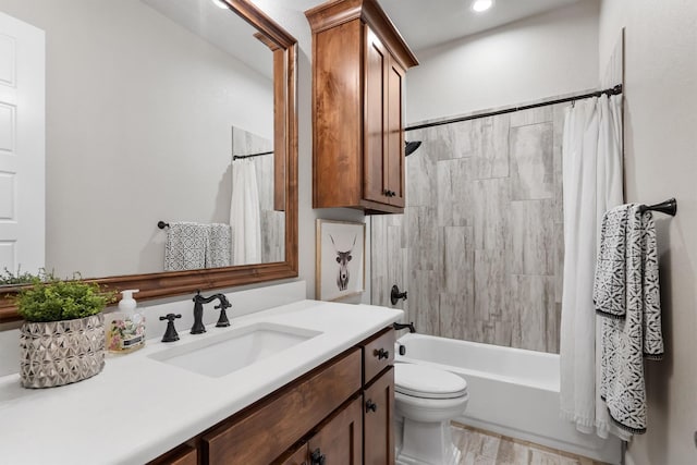 116 Estancia Ct, Decatur, TX 76234 - bathroom featuring vanity, toilet, shower / bath combo, and recessed lighting