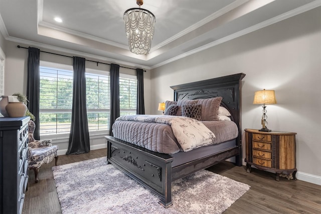 116 Estancia Ct, Decatur, TX 76234 - bedroom featuring multiple windows, a tray ceiling, a chandelier, crown molding, and wood finished floors