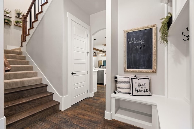 116 Estancia Ct, Decatur, TX 76234 - stairs featuring wood finished floors and arched walkways