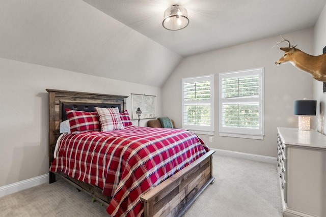 116 Estancia Ct, Decatur, TX 76234 - bedroom with light carpet, baseboards, and vaulted ceiling