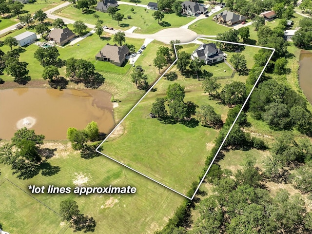 116 Estancia Ct, Decatur, TX 76234 - aerial perspective of suburban area featuring property boundaries highlighted and a large body of water