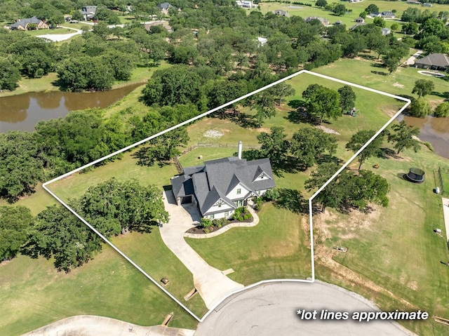 116 Estancia Ct, Decatur, TX 76234 - view of property location with property parcel outlined, a large body of water, and a tree filled landscape