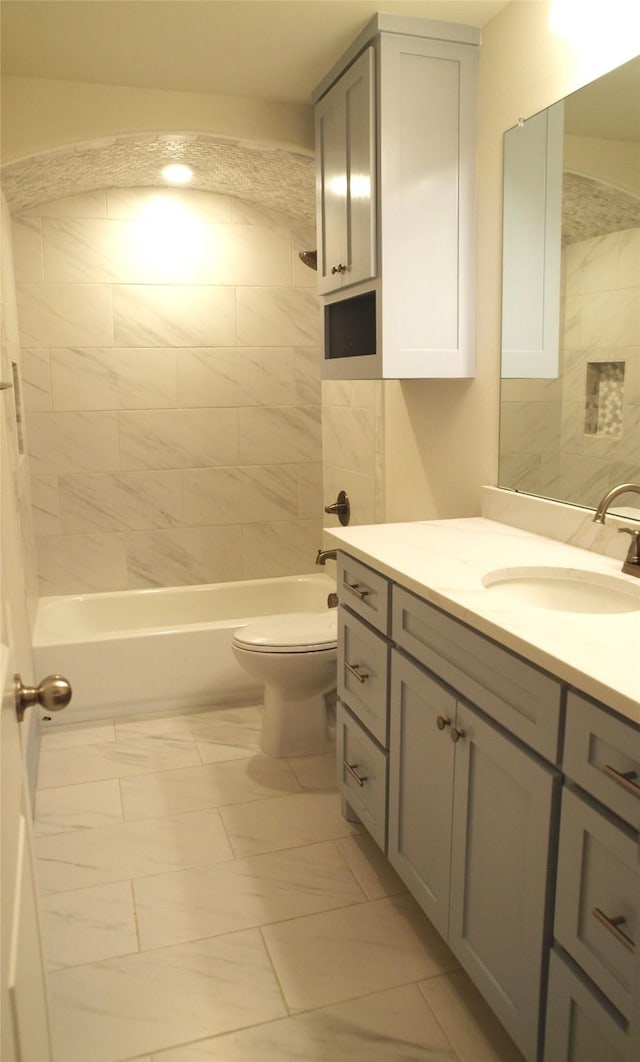 705 Raylan St, Springtown, TX 76082 - bathroom featuring vanity, marble finish flooring, toilet, and bathing tub / shower combination