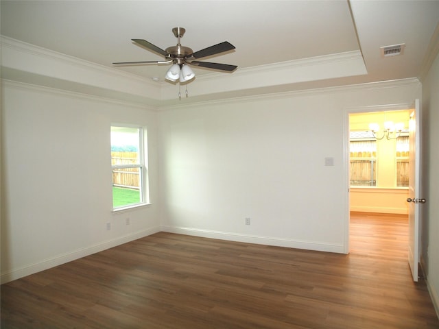 705 Raylan St, Springtown, TX 76082 - empty room with ornamental molding, wood finished floors, ceiling fan, and baseboards