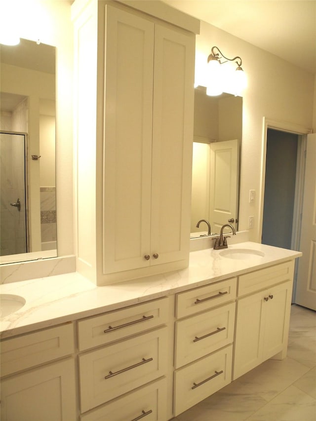 705 Raylan St, Springtown, TX 76082 - bathroom with a stall shower, double vanity, and marble finish flooring
