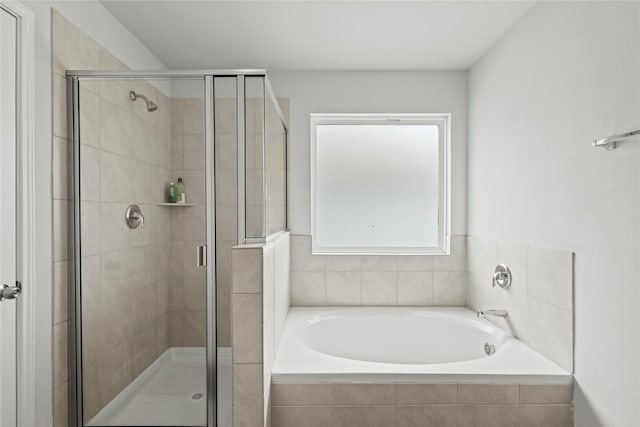 5649 Willamette Dr, Fort Worth, TX 76119 - full bathroom with a garden tub and a shower stall