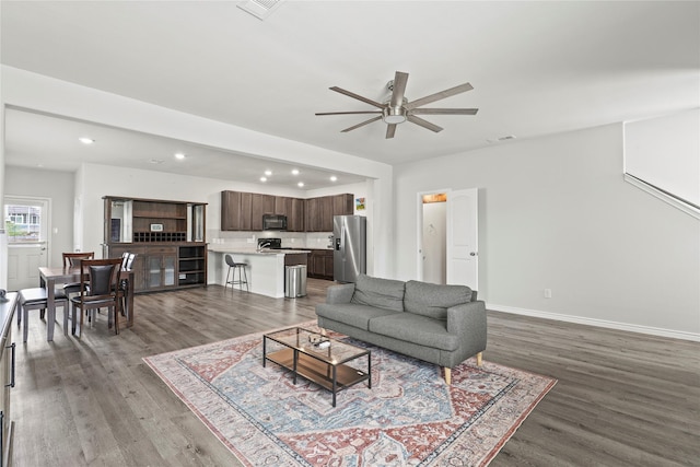 5649 Willamette Dr, Fort Worth, TX 76119 - living area with ceiling fan, recessed lighting, wood finished floors, and baseboards
