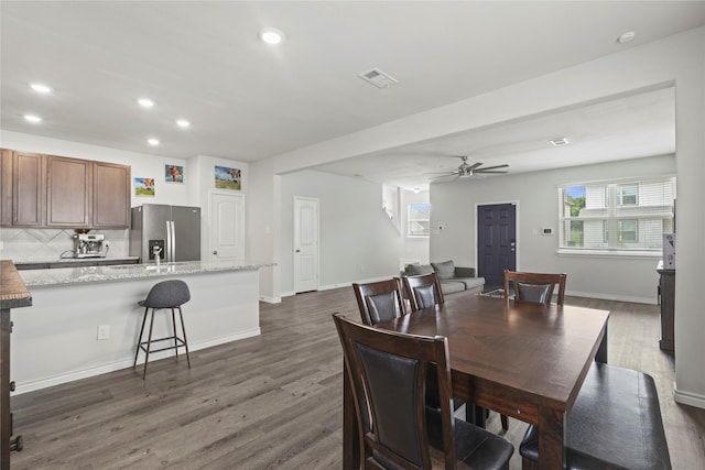 5649 Willamette Dr, Fort Worth, TX 76119 - dining room featuring dark wood-style flooring, plenty of natural light, ceiling fan, recessed lighting, and baseboards