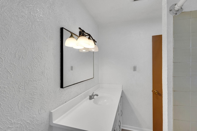 118 Dogwood Trl, Gun Barrel City, TX 75156 - bathroom featuring vanity and a textured wall