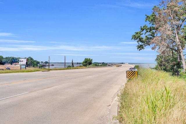 118 Dogwood Trl, Gun Barrel City, TX 75156 - view of asphalt road with a water view