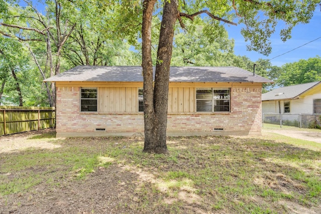118 Dogwood Trl, Gun Barrel City, TX 75156 - view of front of home featuring brick siding, crawl space, board and batten siding, and roof with shingles