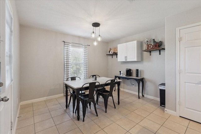 183 Dodge City Trl, Newark, TX 76071 - dining room with light tile patterned floors and baseboards