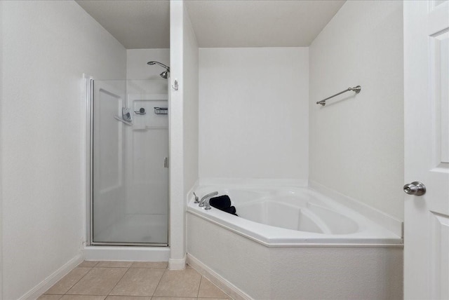 183 Dodge City Trl, Newark, TX 76071 - full bath with a shower stall, tile patterned floors, a bath, and baseboards