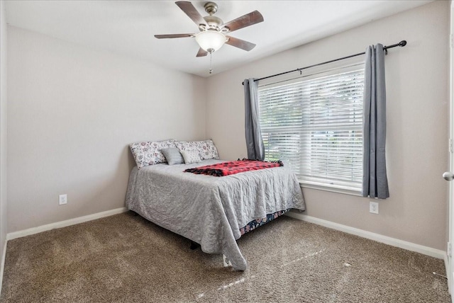 183 Dodge City Trl, Newark, TX 76071 - carpeted bedroom with baseboards and ceiling fan