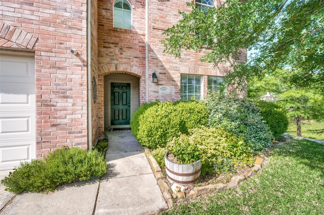 1405 Cardinal Way, Aubrey, TX 76227 - doorway to property featuring brick siding and a garage