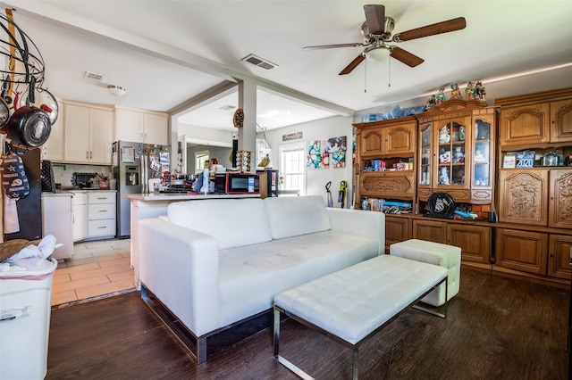 3622 Falls Dr, Dallas, TX 75211 - living area with ceiling fan and wood finished floors