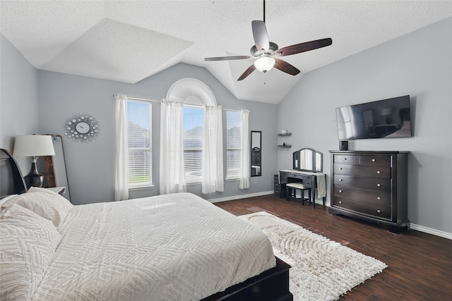 7113 Sundance Ln, Fort Worth, TX 76179 - bedroom featuring lofted ceiling, wood finished floors, baseboards, ceiling fan, and a textured ceiling