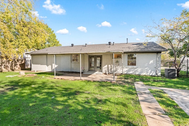 14053 Stardust Ln, Farmers Branch, TX 75234 - back of property featuring french doors, a patio, and cooling unit