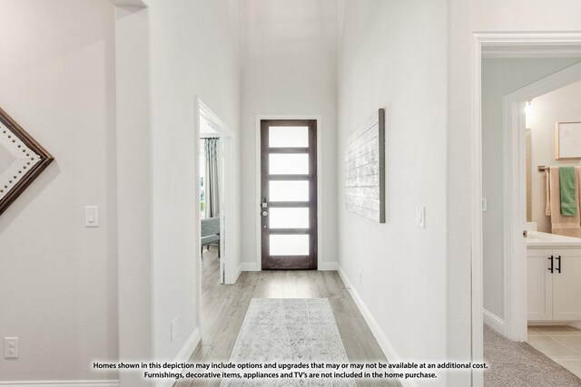 12709 Cactus Ct, Godley, TX 76044 - entrance foyer featuring baseboards and light wood finished floors