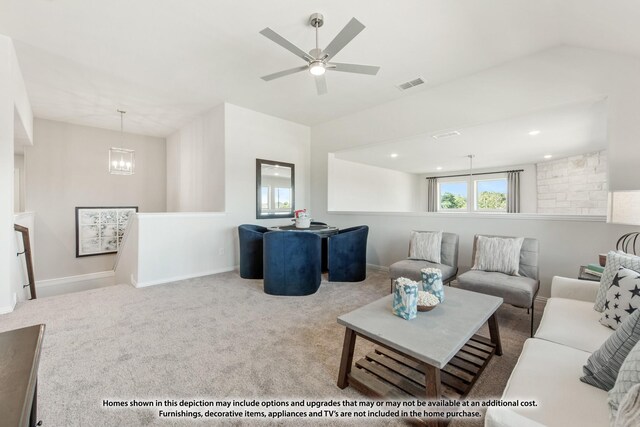 12709 Cactus Ct, Godley, TX 76044 - carpeted living room with ceiling fan, baseboards, and lofted ceiling