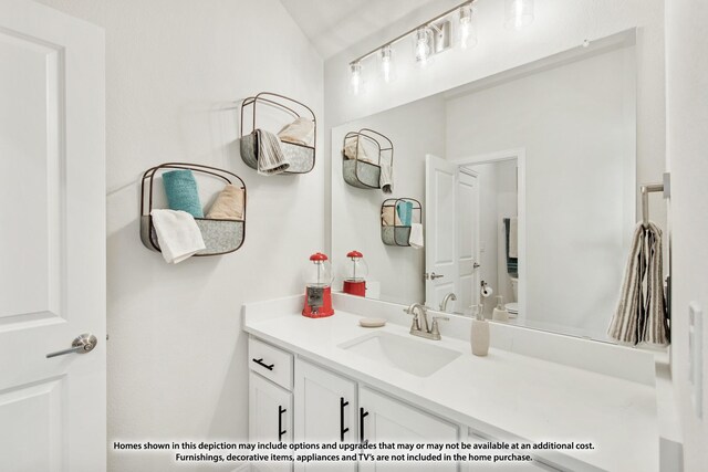 12709 Cactus Ct, Godley, TX 76044 - bathroom featuring vanity and toilet