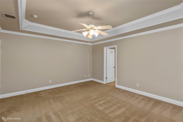 444 Grand Oaks Dr, Shreveport, LA 71106 - unfurnished room with a raised ceiling, ceiling fan, light carpet, baseboards, and crown molding