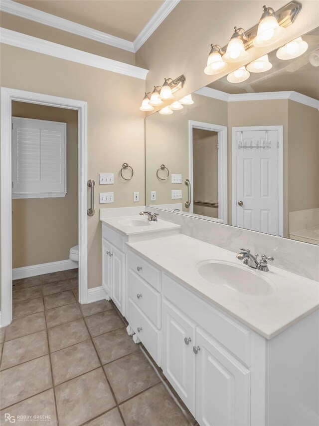444 Grand Oaks Dr, Shreveport, LA 71106 - full bath with double vanity, ornamental molding, tile patterned flooring, toilet, and baseboards