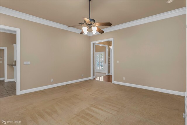 444 Grand Oaks Dr, Shreveport, LA 71106 - empty room featuring ornamental molding, a ceiling fan, light colored carpet, and baseboards