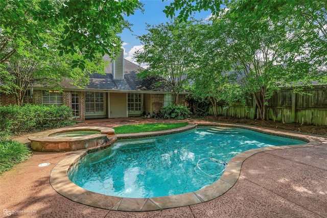 444 Grand Oaks Dr, Shreveport, LA 71106 - view of pool featuring a patio area and a pool with connected hot tub