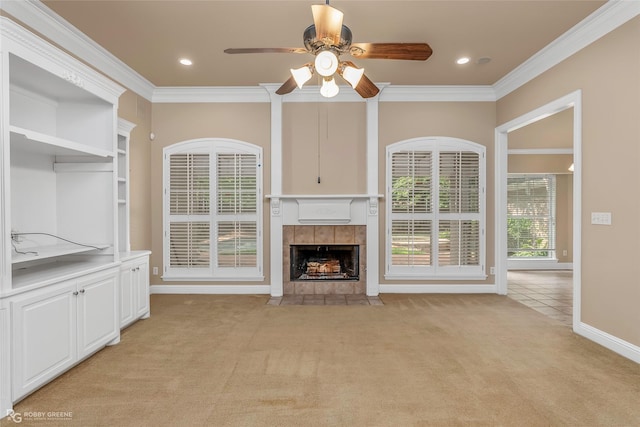 444 Grand Oaks Dr, Shreveport, LA 71106 - unfurnished living room featuring light colored carpet, a ceiling fan, ornamental molding, a fireplace, and baseboards