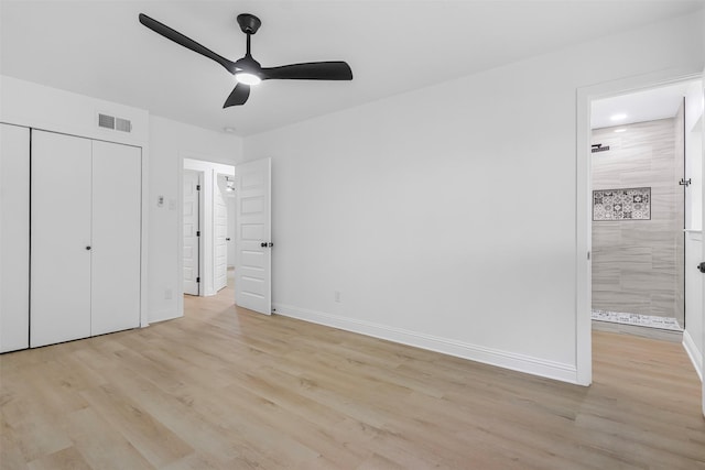 614 Edgedale, Dallas, TX 75232 - unfurnished bedroom featuring light wood finished floors, a closet, baseboards, and ensuite bathroom