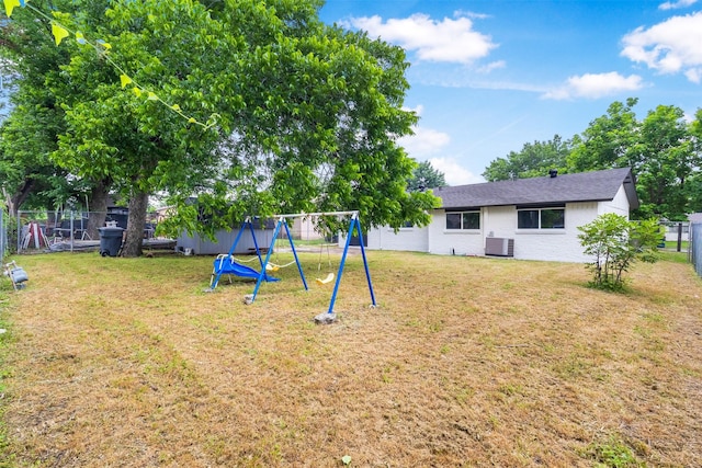 614 Edgedale, Dallas, TX 75232 - view of yard featuring a playground and cooling unit