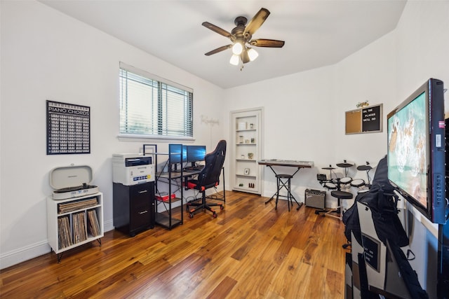 2405 La Costa Dr, Rowlett, TX 75088 - home office with wood finished floors, ceiling fan, and baseboards