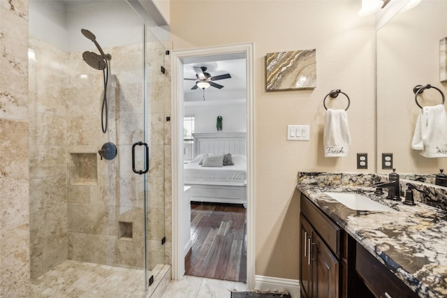 2405 La Costa Dr, Rowlett, TX 75088 - full bathroom featuring ensuite bath, a shower stall, vanity, and a ceiling fan
