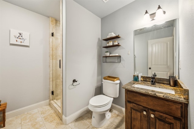 2405 La Costa Dr, Rowlett, TX 75088 - full bathroom with vanity, toilet, a stall shower, and baseboards
