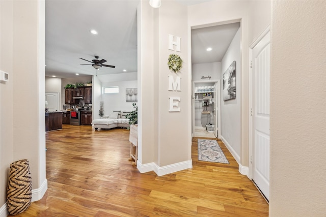 2405 La Costa Dr, Rowlett, TX 75088 - hallway with light wood-style flooring, recessed lighting, and baseboards