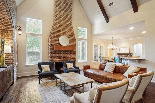 304 Van Oaks Dr, Colleyville, TX 76034 - living room featuring high vaulted ceiling, dark wood-type flooring, baseboards, a chandelier, and a fireplace
