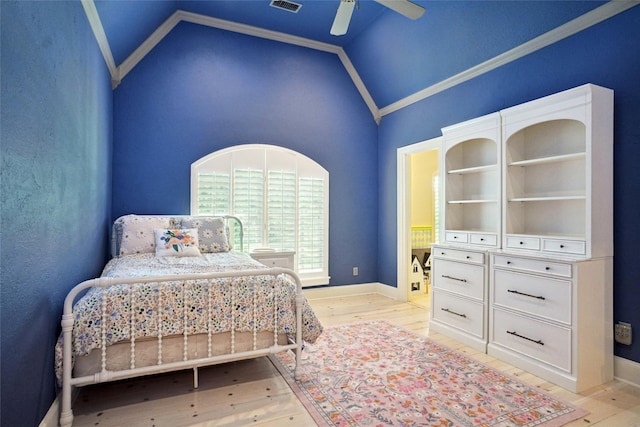 304 Van Oaks Dr, Colleyville, TX 76034 - bedroom with vaulted ceiling, light wood-style floors, crown molding, a ceiling fan, and baseboards