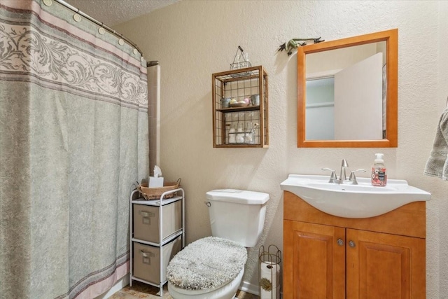 109 S Patricia St, Waco, TX 76705 - full bath with vanity, toilet, a textured wall, and a shower with shower curtain