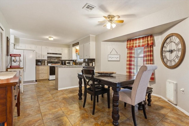 109 S Patricia St, Waco, TX 76705 - dining space with a ceiling fan, light tile patterned floors, and baseboards