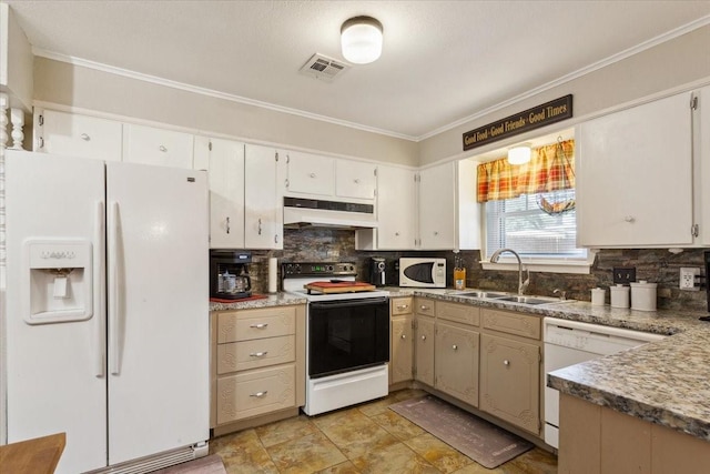 109 S Patricia St, Waco, TX 76705 - kitchen with white appliances, under cabinet range hood, a sink, ornamental molding, and backsplash