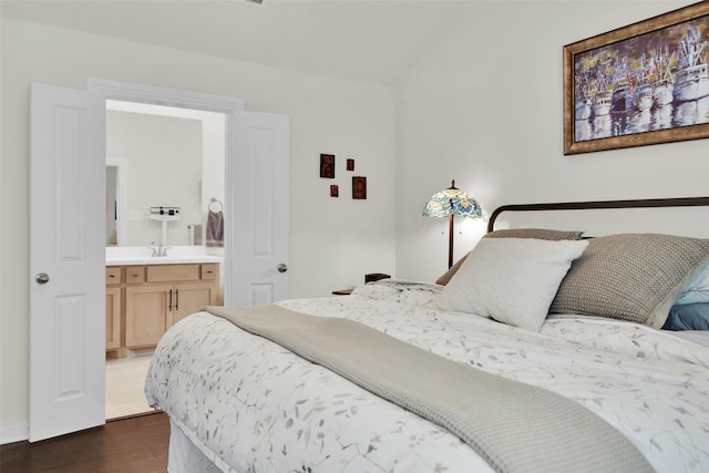 3736 Queen Rd, Sherman, TX 75090 - bedroom featuring dark wood finished floors, ensuite bath, a sink, and lofted ceiling
