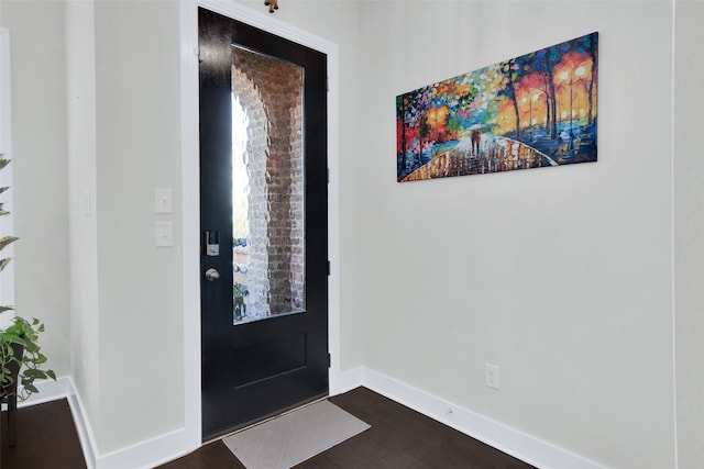 3736 Queen Rd, Sherman, TX 75090 - entrance foyer with dark wood finished floors and baseboards