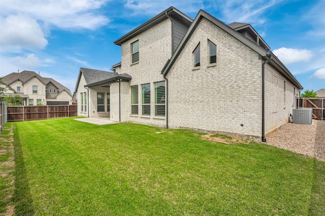 2800 Carrington Dr, Mansfield, TX 76063 - back of house with brick siding, central AC unit, and a patio