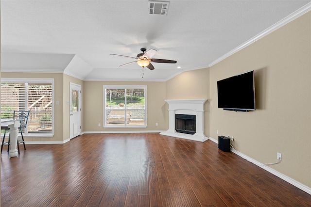 235 Carriage Dr, Willow Park, TX 76087 - unfurnished living room with a ceiling fan, a fireplace with raised hearth, dark wood-style flooring, baseboards, and ornamental molding