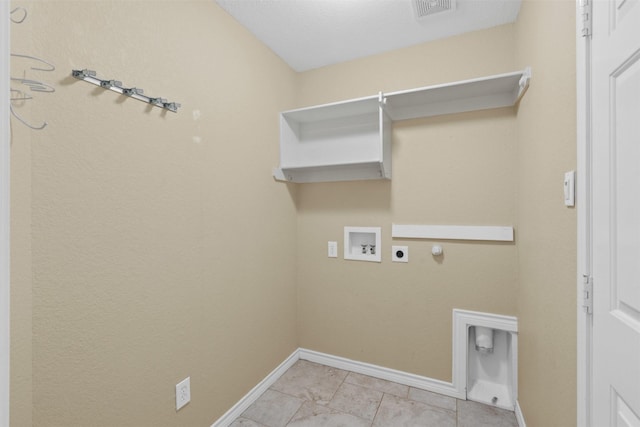 235 Carriage Dr, Willow Park, TX 76087 - washroom with hookup for an electric dryer, gas dryer hookup, baseboards, hookup for a washing machine, and light tile patterned flooring