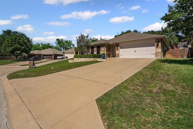 235 Carriage Dr, Willow Park, TX 76087 - single story home featuring driveway, brick siding, and an attached garage