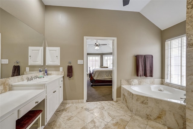 3401 Beckingham Ct, Flower Mound, TX 75022 - ensuite bathroom featuring a ceiling fan, plenty of natural light, vanity, lofted ceiling, and a garden tub