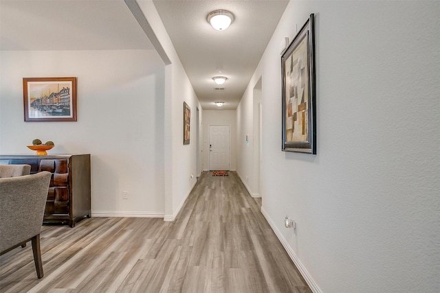 6100 True Vine Rd, Fort Worth, TX 76123 - corridor featuring light wood-style flooring and baseboards
