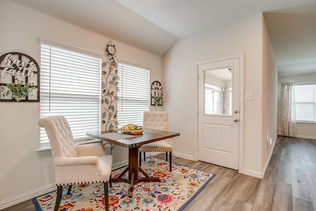 6100 True Vine Rd, Fort Worth, TX 76123 - dining room with light wood-style flooring, baseboards, and lofted ceiling